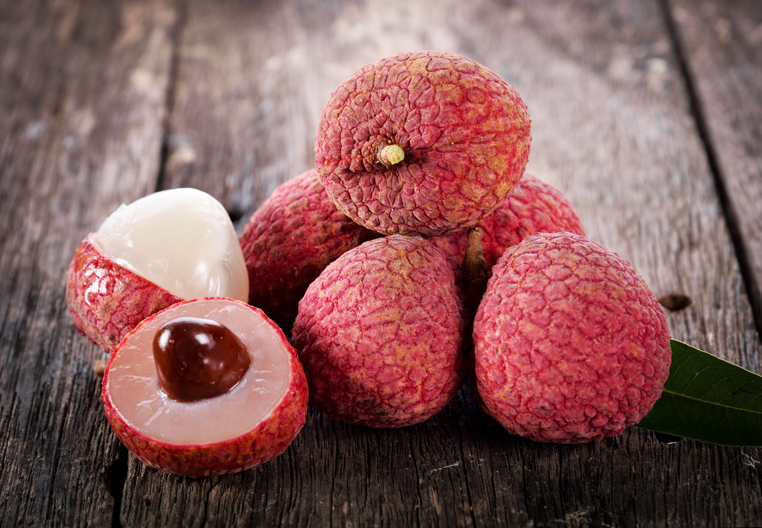 lychee fruit on wooden background